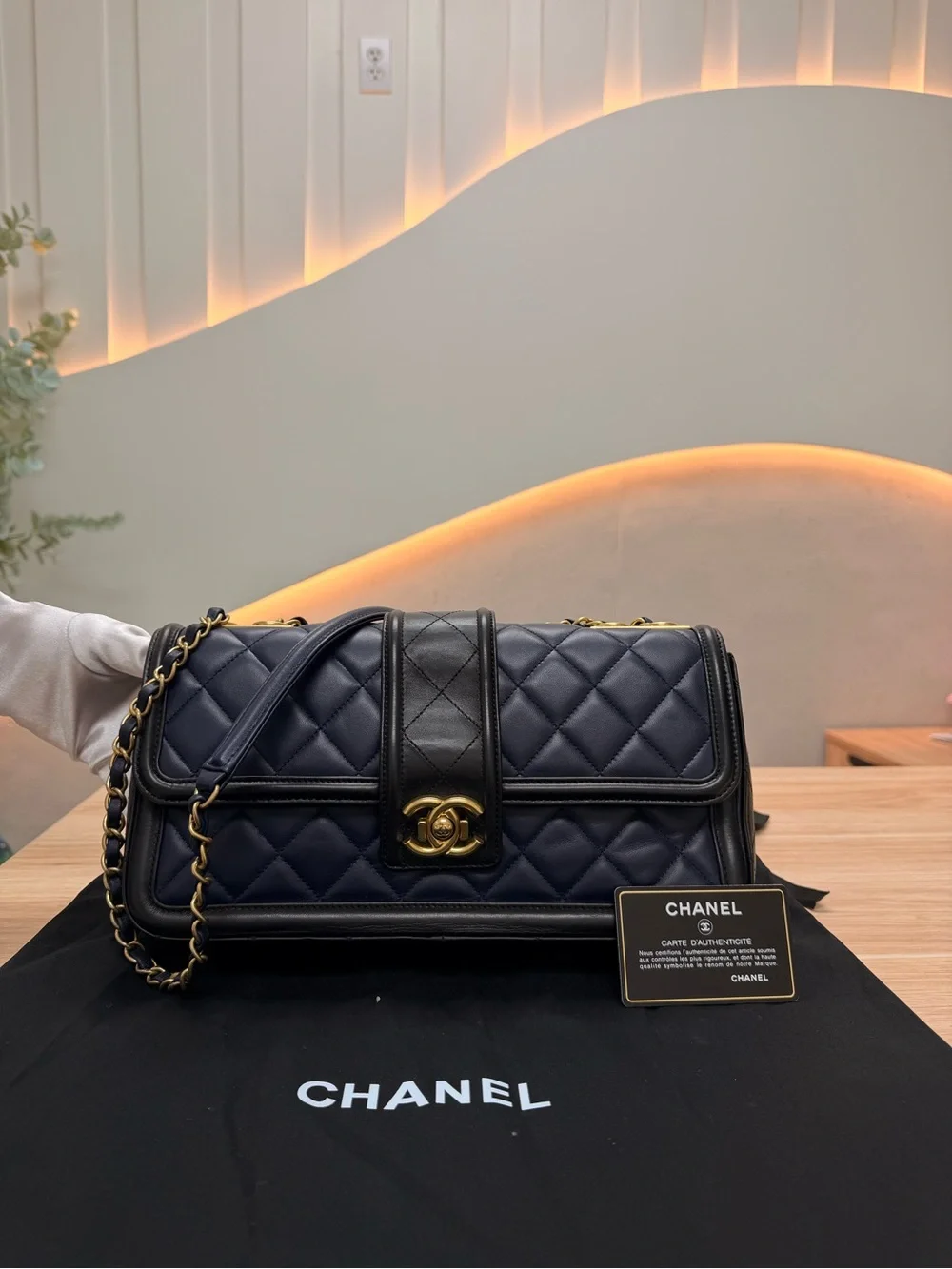 CHANEL Quilted Leather Shoulder Bag in Navy and Black with Gold Hardware